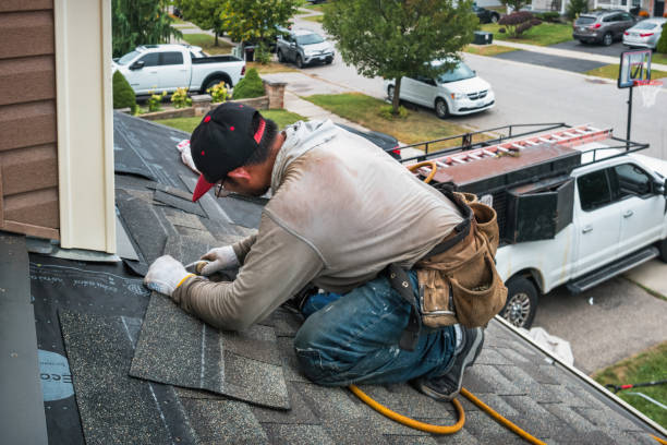Professional Flat Roof Repair technician working in Pheba, MS